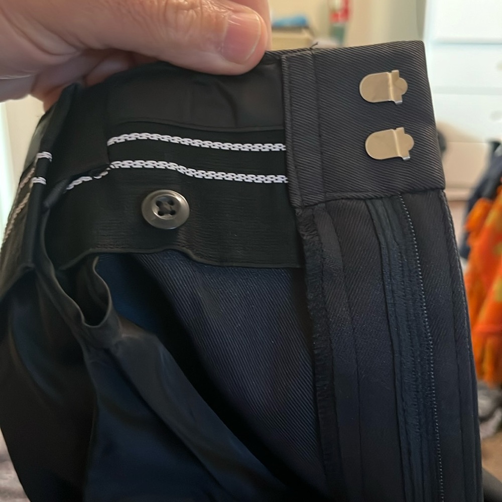 Professional grey colored pants. Good for uniform. Will need hemming.